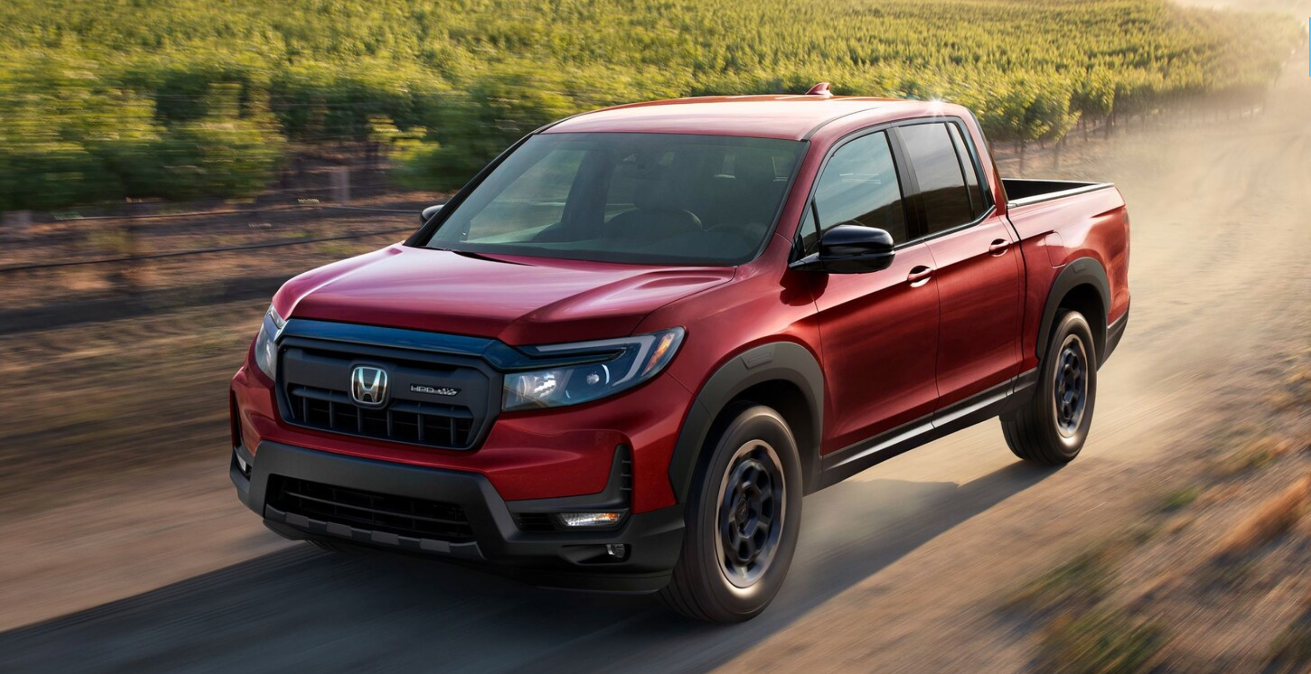 The 2025 Honda Ridgeline in Radiant Red Metallic for sale in Parkersburg, WV.