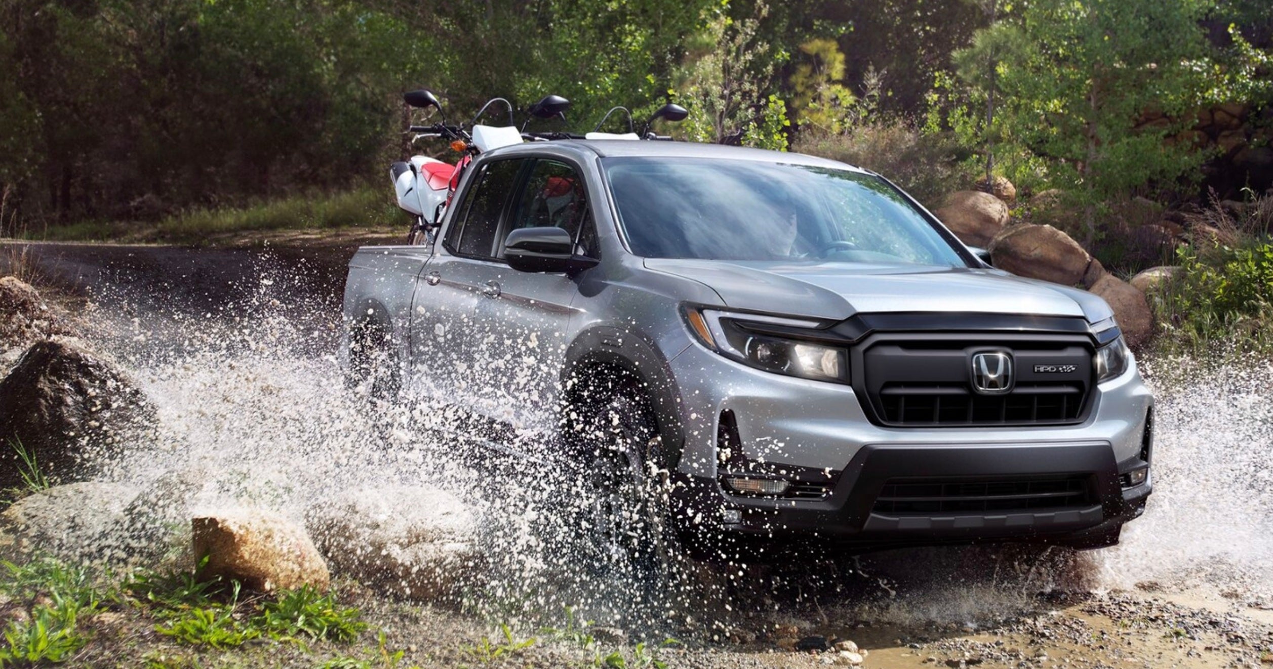 The 2025 Honda Ridgeline in Solar Silver Metallic for sale near Athens.